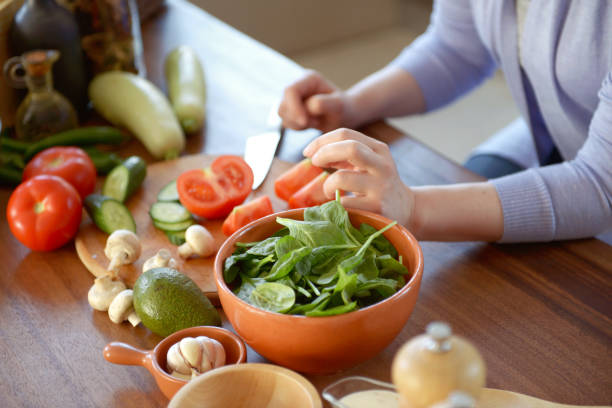 istock woman cooking in the kitchen 964139350