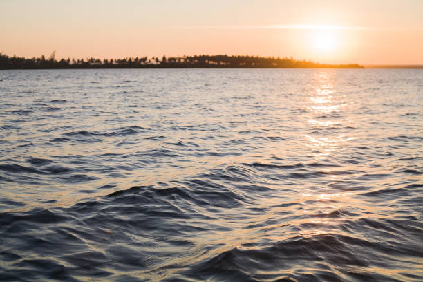 istock sunset by canoe over the ocean 964139564