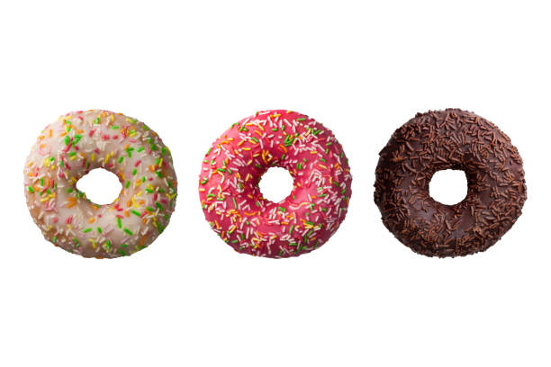 istock Set of three different colorful donuts isolated on white background 964139644