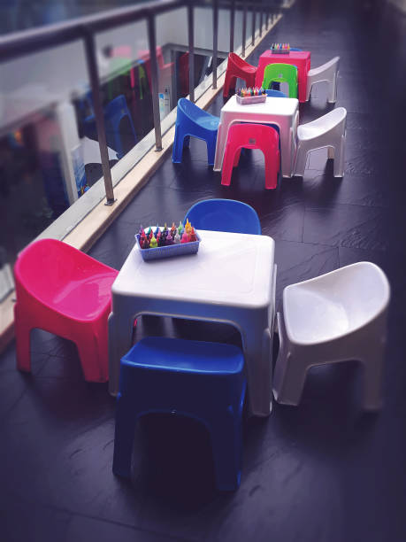 istock Sets of Small Tables and Chairs for Art Class 964140302