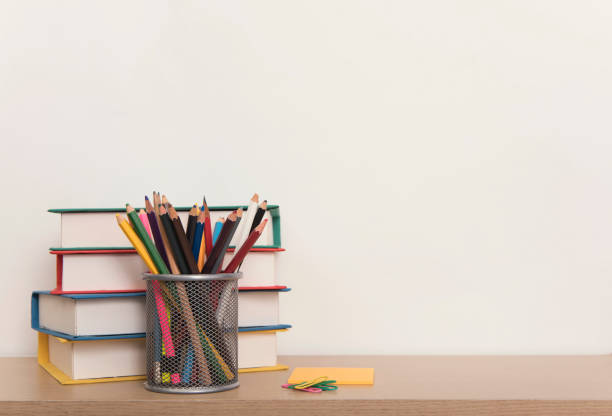 istock School supplies on wood table background. empty copy space. 964147408