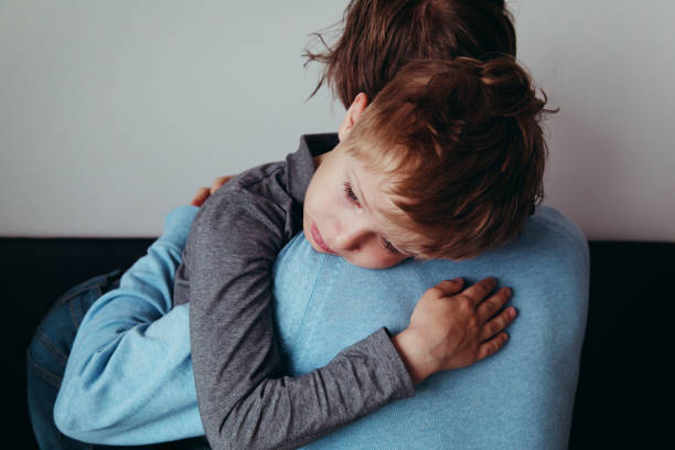 istock Father comforting sad child, parenting, sorrow 964148086