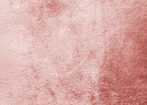 Rosa fondo de terciopelo color rosa oro o textura de la franela de terciopelo hecha de algodón o lana con material de tela raso aterciopelado mullido suave paño color metálico photo