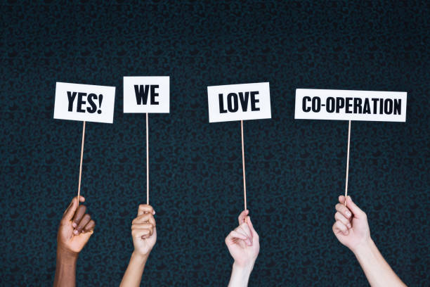 istock Hands hold signs reading 