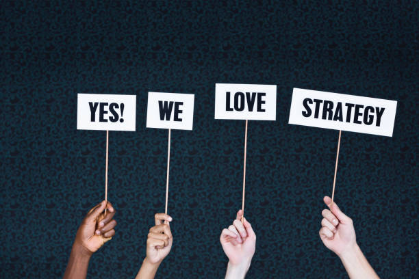 istock Hands hold signs reading 
