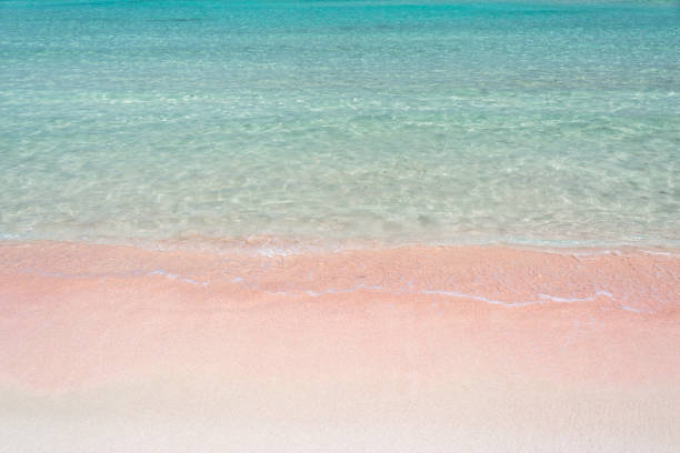 istock Pink sand and turquoise pristine water one Balos beach  in Crete, Greece 964159400