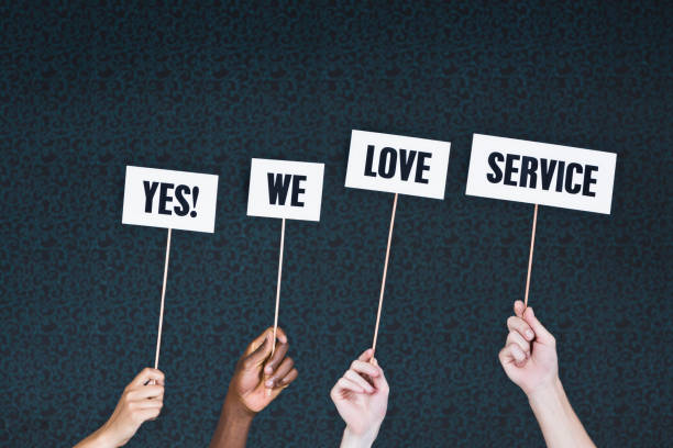 istock Hands hold signs reading 