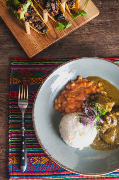 istock Seco de cabrito - traditional peruvian plate colorful shot 964163522