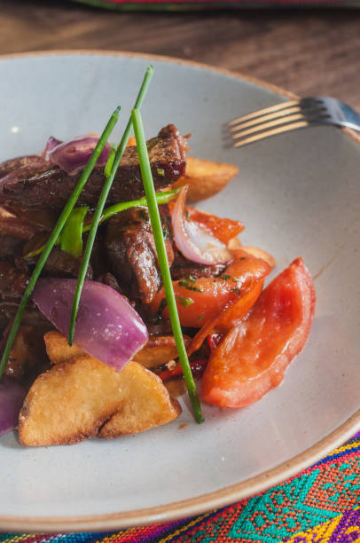 istock Lomo saltado traditional peruvian plate cwith beef and potatoes 964163590