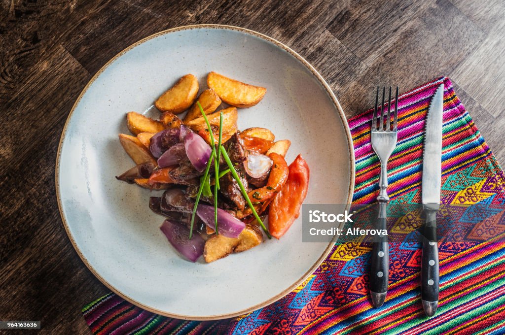 Lomo saltado traditional peruvian plate beef and potatoes Lomo saltado traditional peruvian plate close up Food Stock Photo