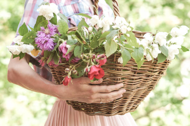 istock Woman with flowers 964176142