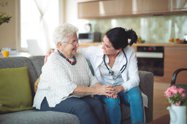 istock Social worker is visiting a senior woman 964190930