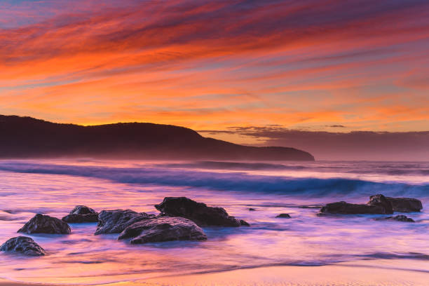 istock Rocky Sunrise Seascape 964196626