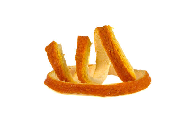 istock Dried orange peel on a white background 964199602