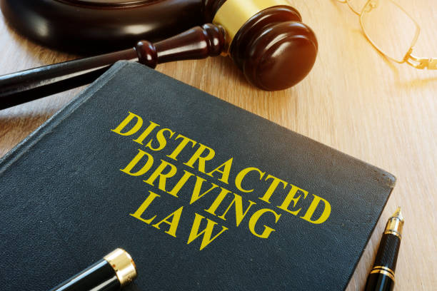 istock Distracted driving law and gavel on a desk. 964199734