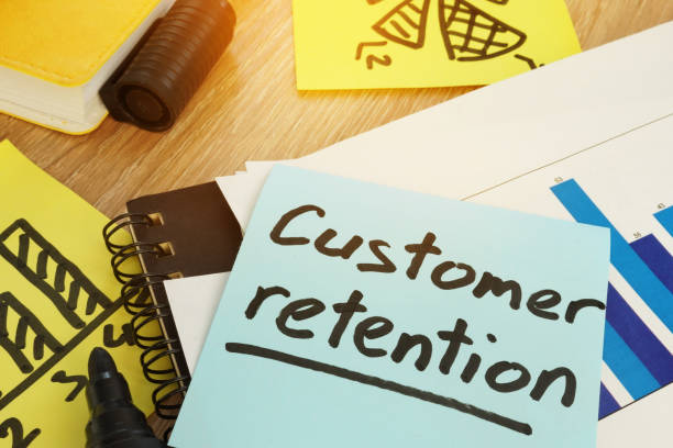 Customer retention written on a memo stick. Customer retention written on a memo stick. customer retention stock pictures, royalty-free photos & images