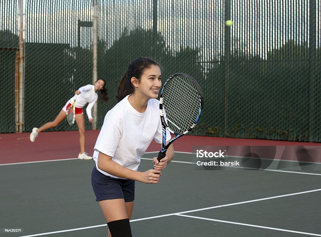 Dziewczyny gry w tenisa - Zbiór zdjęć royalty-free (Tenis)
