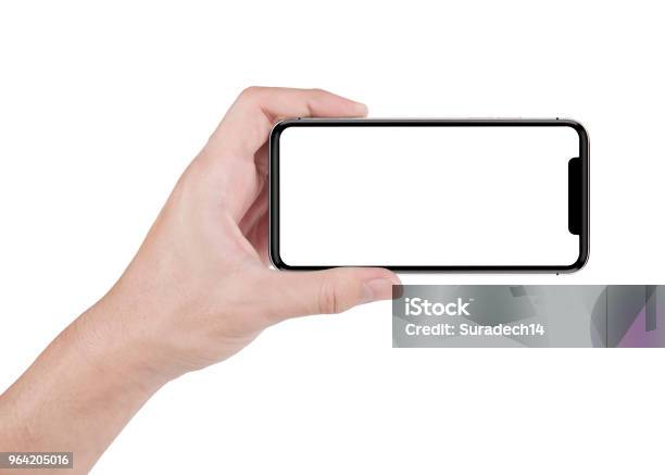 手をつなぐ水平白い画面に黒のスマート フォン - 電話機のストックフォトや画像を多数ご用意 - 電話機, 手, 横位置