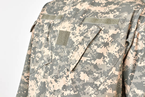 istock Close up military jungle army uniform. 964205502