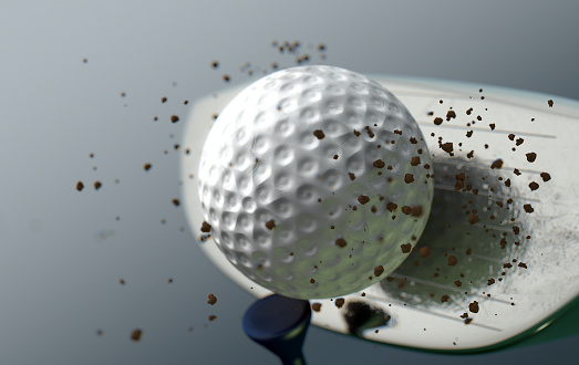 An extreme closeup slow motion action capture of a golf wood club striking a ball with dirt particles emanating on a dark isolated background - 3D render