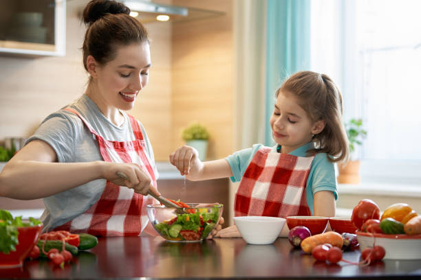 istock Happy family in the kitchen. 964219432