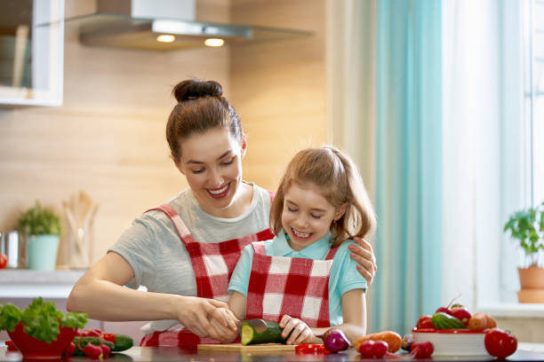 istock Happy family in the kitchen. 964219520