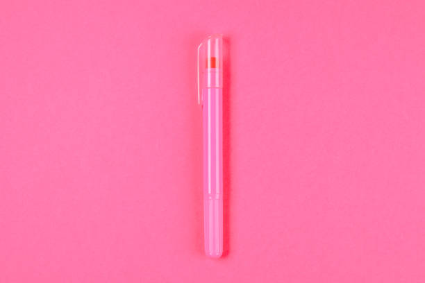 istock Pink felt-tip pen on a pink pastel background. Summer. Top view. Flat lay. Copy space. 964219526