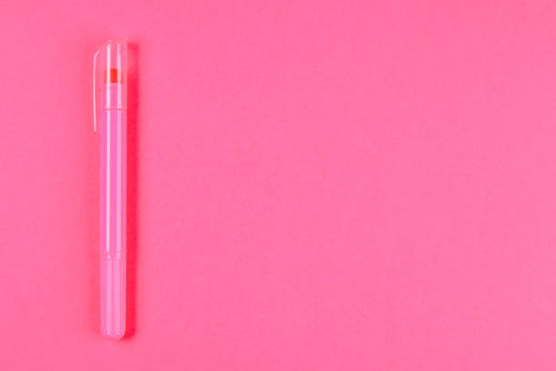 istock Pink felt-tip pen on a pink pastel background. Summer. Top view. Flat lay. Copy space. 964219528