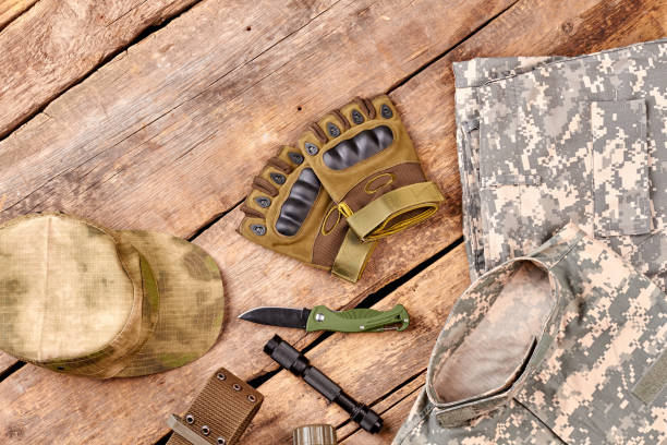 istock Military supplies on wood flat lay. 964225988