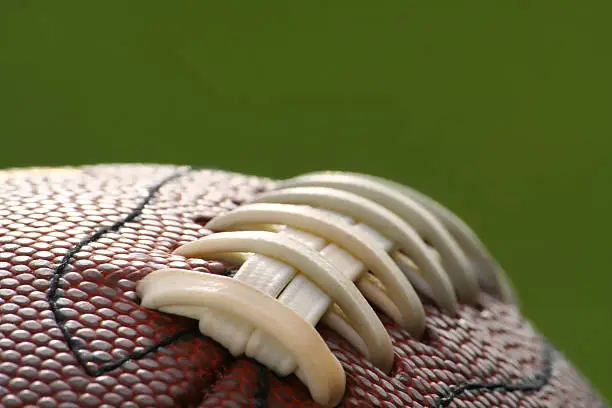 Photo of Football on green background