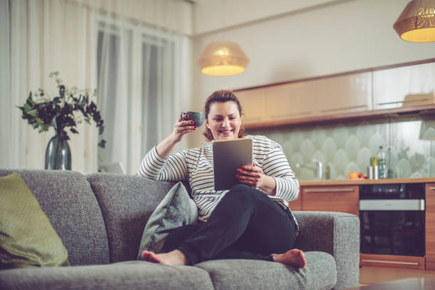 istock Young woman at home 964233682