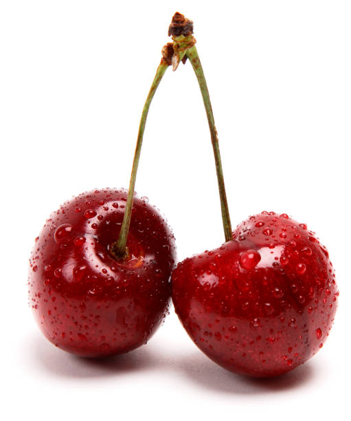 istock 2 red cherries, on a white background, with condensation, and a drop shadow 964237244