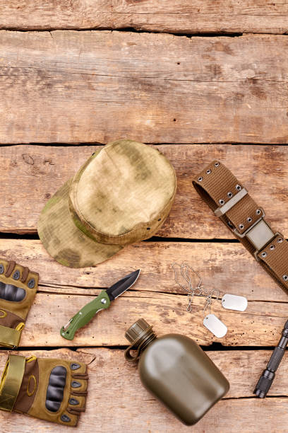 istock Soldiers essentials on wood. 964237650