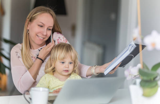 istock Balancing a new business and a new baby 964237694