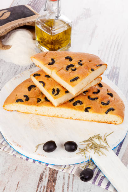 istock Focaccia bread on a wooden board. 964241160