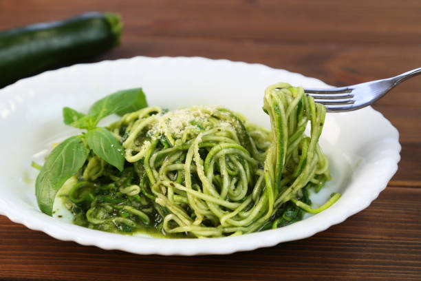 Vegetables noodles pasta of genovese I sliced vegetables into a noodles form. pesto sauce stock pictures, royalty-free photos & images