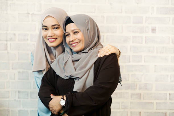 istock mother and daughter portrait 964241730