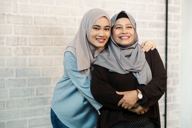 istock mother and daughter portrait 964242096