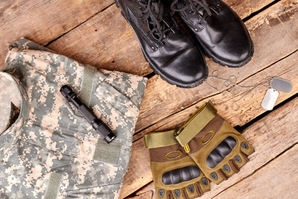 istock Flat lay, set of military camouflage outfit. 964245600