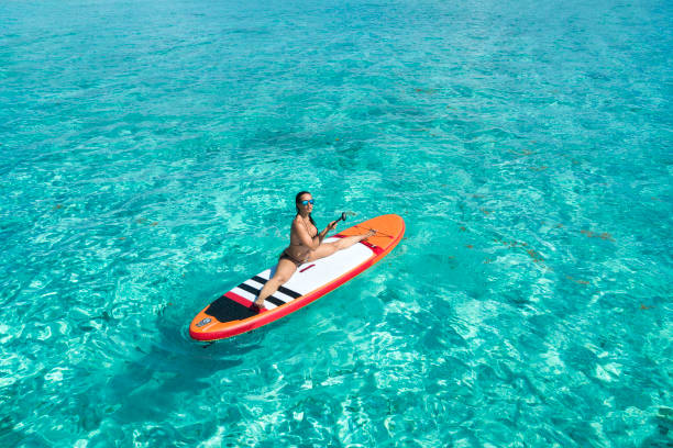 istock Woman on the paddleboard 964246648