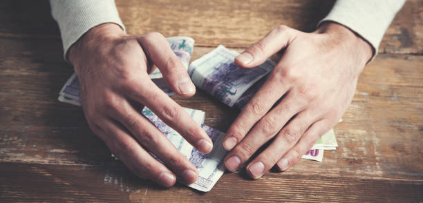 istock Man holdig  money in his hands 964248958