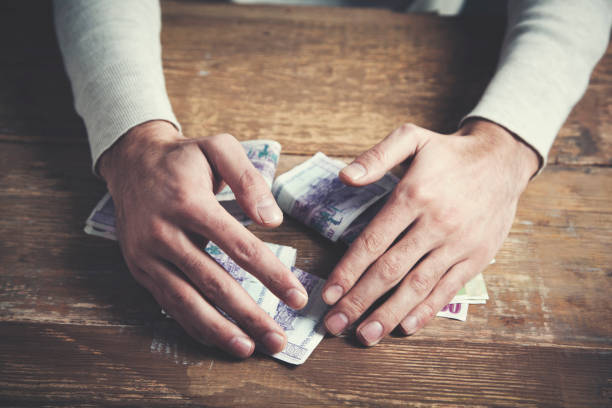 istock Man holdig  money in his hands 964248976