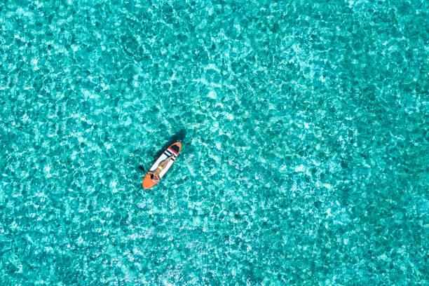 istock Woman on the paddleboard 964249158
