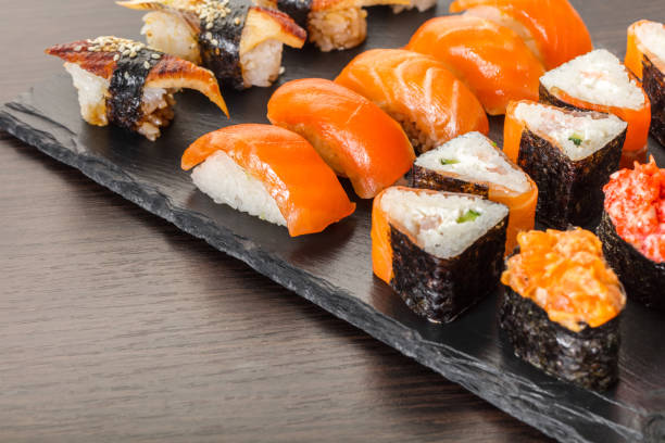 istock japanese cuisine, sushi set on a board 964249802