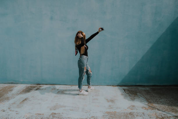 istock Young woman taking a selfie 964254562