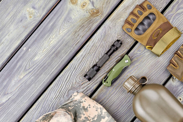 istock Soldiers attributes on wood with copyspace. 964256878