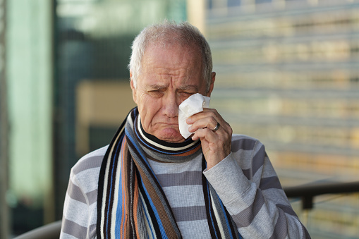 Man Crying Into A Tissue Stock Photo - Download Image Now - 70-79 Years,  Adult, Adults Only - iStock