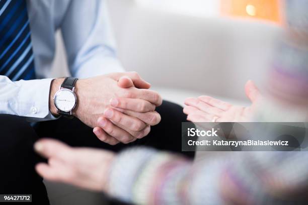 Male Hands In Grasp Stock Photo - Download Image Now - Psychotherapy, Mental Health Professional, Discussion