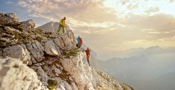 istock Mountaineers climbing on mountain 964273814