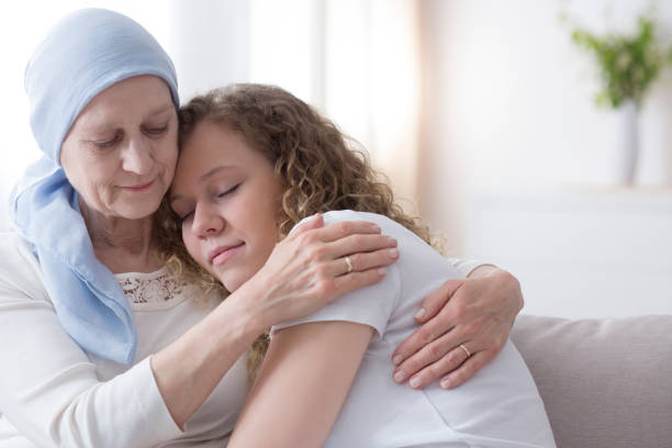 istock Daughter hugging sick elderly mother 964277030